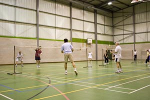 Club night at Epsom College Sports Hall; Bookham Badminton Club, Surrey, UK