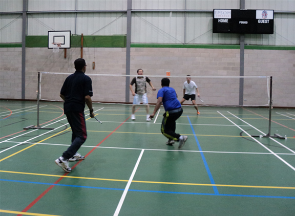 Club night at Epsom College Sports Hall; Bookham Badminton Club, Surrey, UK